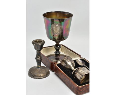 A SELECTION OF SILVER ITEMS, to include a silver christening set, a napkin ring, egg cup and teaspoon, encased in a lined bro