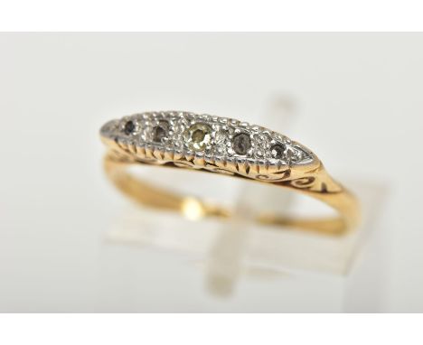 A YELLOW METAL FIVE STONE DIAMOND BOAT RING, the ring head of a lozenge shape set with single cut diamonds and diamond chips,