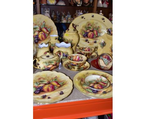 A COLLECTION OF AYNSLEY ORCHARD GOLD GIFT AND TEAWARES, nineteen pieces comprising two breakfast cups and saucers, two red te