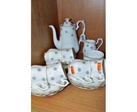 A ROYAL ALBERT 'STAR OF EVE' FIFTEEN PIECE COFFEE SET, comprising a coffee pot, milk jug, sugar bowl, six cups and six saucer
