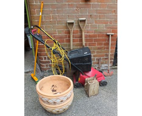 A Power Devil electric lawn mower, various garden tools, ornament, vintage oil can, etc