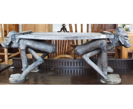 An unusual Ethnic double ended bench