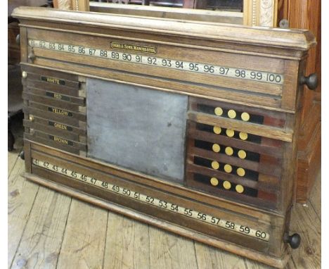 A vintage oak billiards/snooker score board marked Orme & Sons