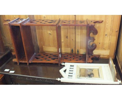 A hardwood hanging shelf unit and a small vintage white painted mirror with shelf