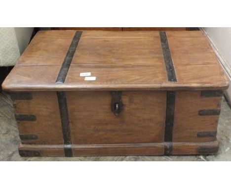 A hardwood metal bound trunk