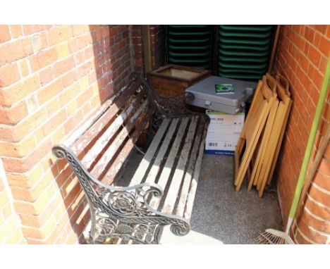 A metal end and wooden slat garden bench, a camping satellite dish and an electric cool box in packaging