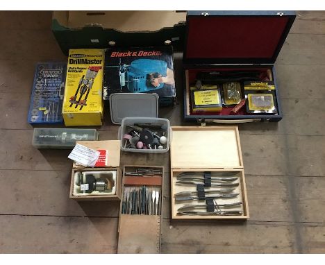 A box of assorted tools to included boxed Black &amp; Decker electric saw, a boxed Barrus Drill Master, a Draper Tap &amp; Di