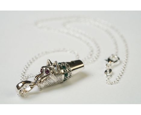 Silver dog whistle with ruby eyes and emerald collar, on silver chain 