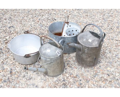 Pair of vintage watering cans etc 