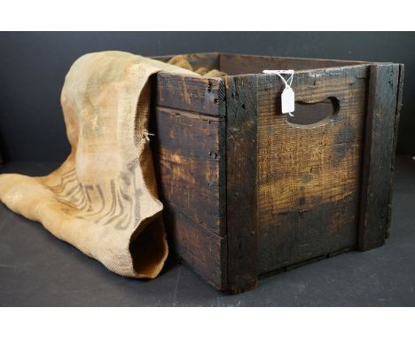 Seven vintage hessian sacks to include 2 x French ' Grande Huilerie Bordelaise ' examples, contained within a wooden crate 