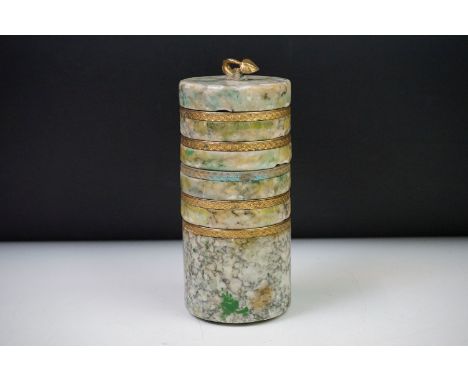 Cylindrical marble storage tower, each section lifting off to reveal five storage compartments, gilt metal mounts surmounting