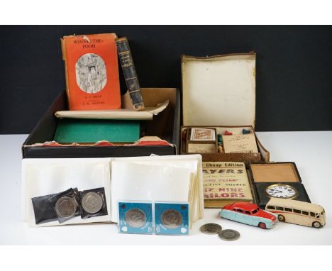 A box of mixed collectables to include an 8 day travel clock, coins, books, ephemera, games, dinky die cast cars....etc. 
