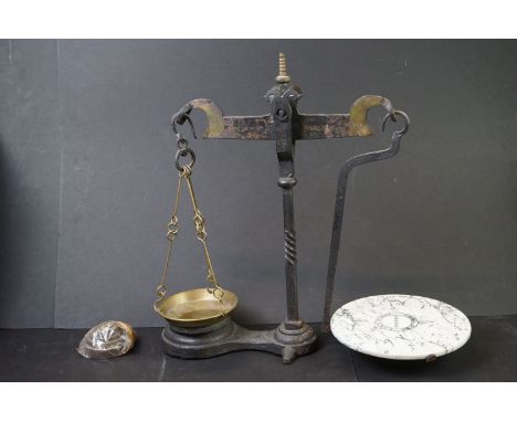 A set of early 20th century counter balance scales, the ceramic tile marked R.E &amp; F. Thorns Norwich, together with weight