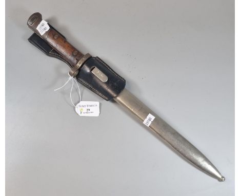 German Second World War period bayonet with polished scabbard and leather frog. (B.P. 21% + VAT) 