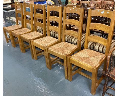 Set of six robust pine ladder back dining chairs with seagrass seats.  (6)  (B.P. 21% + VAT) 