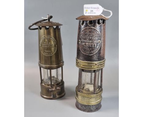 Original brass miner's safety lamp, together with another similar by the 'Protector lamp and Lighting company Ltd' in unused 