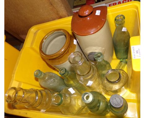 Box containing stone hot water bottle, stoneware pot  and various vintage glass bottles including: Esso Lube, R Dubbing Cod B