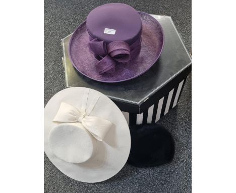 Large striped cardboard hat box containing three ladies vintage hats; one purple fabric and straw by Gold by Michael H, a wid