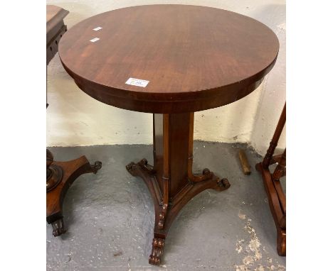 19th century mahogany lamp table, the circular moulded top above a shaped pedestal on tri-form base with scroll decorated fea