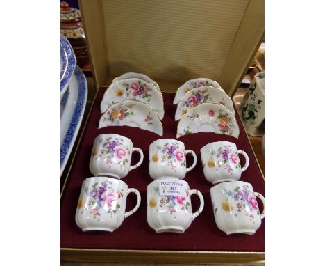 Set of six Royal Crown Derby 'Derby Posies' teacups and saucers in original box, transfer printed with roses and other garden