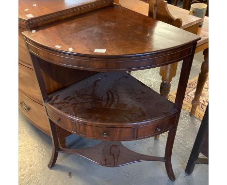 19th century mahogany bow front corner wash stand, having two tiers with single and dummy drawers on outswept legs.  (B.P. 21