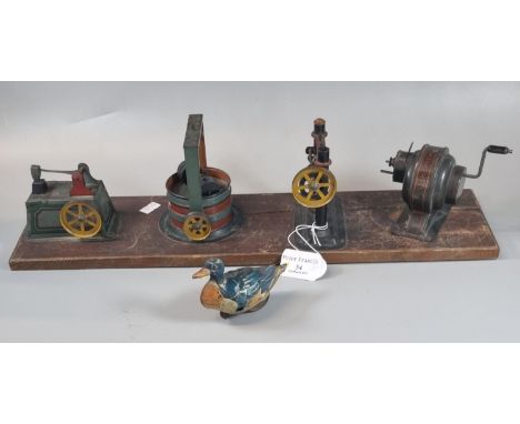 A group of tin plate machinery and generator items (which would have been driven by a stationery engine), together with a Dyn