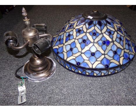 Metal lamp base with arrangement for three light bulbs and very large blue and cream Tiffany style lamp shade.  (B.P. 21% + V
