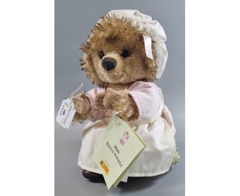 Steiff 'Mrs Tiggy-Winkle' soft toy with original clothing and button ear.  Labelled.  (B.P. 21% + VAT) 