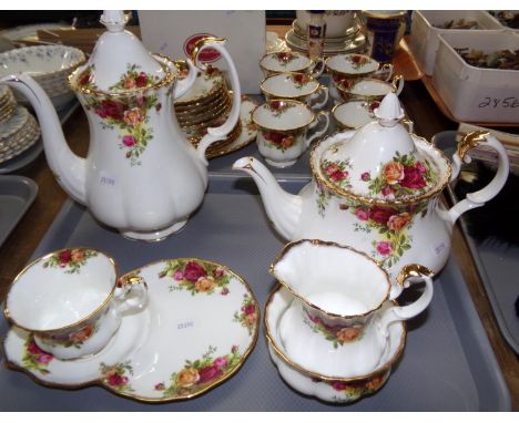 Two trays of Royal Albert 'Old Country Roses': six teacups, saucers and tea plates and a sandwich plate, large teapot and cof