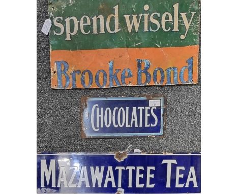 A group of single sided enamel advertising signs: 'Spend Wisely Brooke Bond' (aluminium), 'Chocolates' and 'Mazawattee Tea'. 