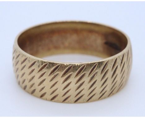 9ct gold bark finish wedding ring, size V, 5.6g approx. (B.P. 21% + VAT)  The ring is quite wide, on our ring sizer it sits b