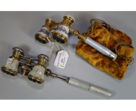 Two pairs of French opera glasses, one mother of pearl finish, the other with floral enamel finish. (2) (B.P. 21% + VAT)  the