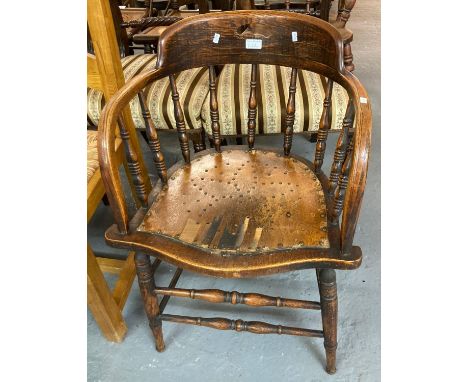 Early 20th century bentwood spindle back smoker's bow chair with pierced seat.  (B.P. 21% + VAT) 