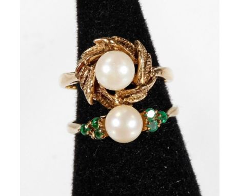 Two 9ct gold dress rings, comprising a cultured pearl twist ring, and a cultured pearl ring with two green coloured stone bor