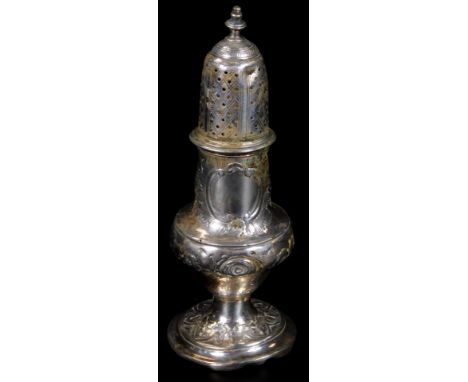 A George III silver sugar sifter, with domed pierced lid, urn finial, bellied circular body, repoussé decorated and chased wi