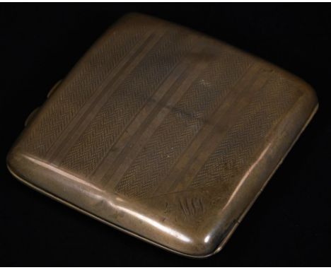 A George V silver cigarette case, of shaped square form, with rounded ends and thumb mould handles, partially engine turned w