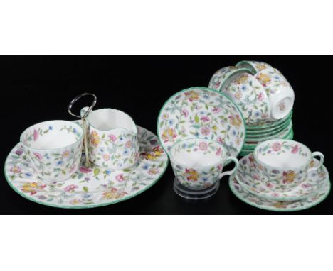 A Minton Haddon Hall part service, to include single stand, 26cm W, milk jug, sugar bowl, cup, saucers, plates, etc. marked b