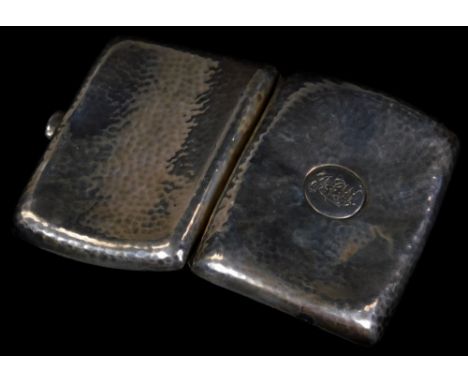 An Edwardian silver cigarette case, of shaped rectangular form, with thumb mould handle, engine turned with initialled cartou