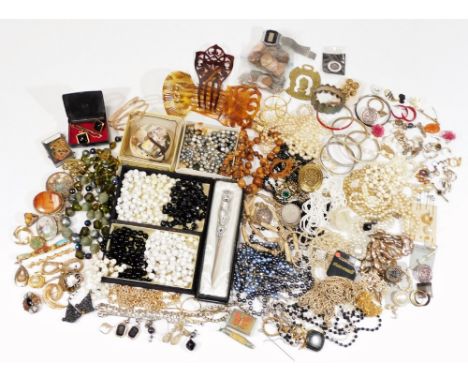 A large quantity of modern costume jewellery and effects, to include beaded necklaces, horse brass, letter opener, snake bang