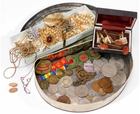 A small quantity of jewellery, coins and cap badges, to include gold plated cuff links and collar studs, two 9ct gold bar bro