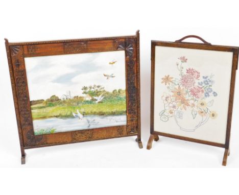 An mid 20thC carved firescreen, centred by an  A G Wilson oil on canvas of The River Glaven, signed and titled, 49cm x 56cm a