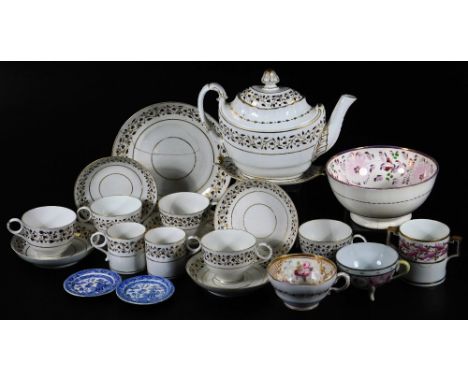 An early 19thC porcelain part service, comprising teapot and stand, 17cm H, tea cups, serving plate, coffee cans, saucers, et