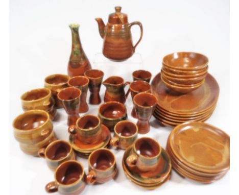 A 20thC Lamorna Pottery Cornwall part dinner service, of mottled form, to include bottle jar, 28cm H, beakers, coffee pot, mi