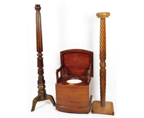 An early 20thC mahogany torchere, with acanthus leaf stem, on triple supports, and another with turned stem, on square base w