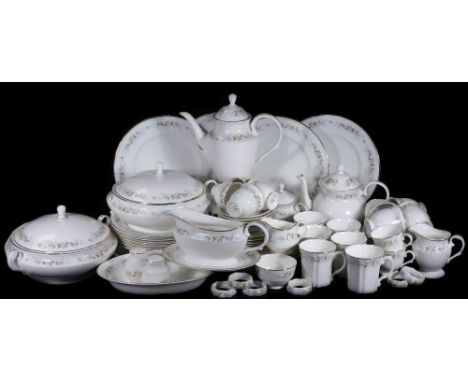 A comprehensive Mayfair bone china dinner service, decorated with flowers, to include a pair of lidded tureens, 31cm W, napki