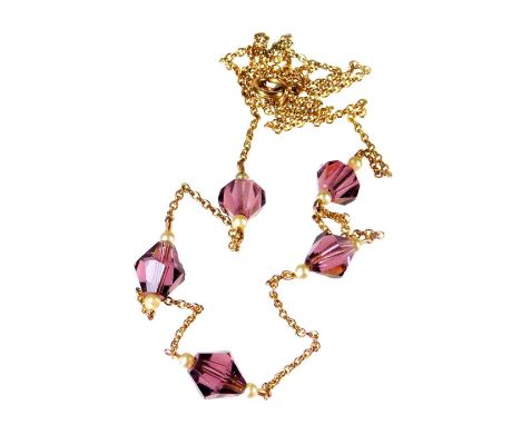 A faceted amethyst and seed pearl necklace, with design of five faceted amethyst stones, and two seed pearls to each amethyst