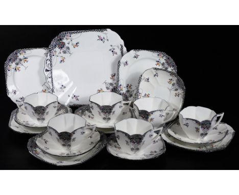 A mid 20thC Shelley Art Deco 11575 part tea service, decorated with flowers, black leafy tree pattern part service, to includ