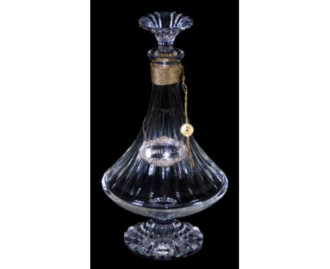 A 20thC Baccarat glass decanter, with compressed stopper, bell shaped flared body, slender stem and circular foot, marked ben