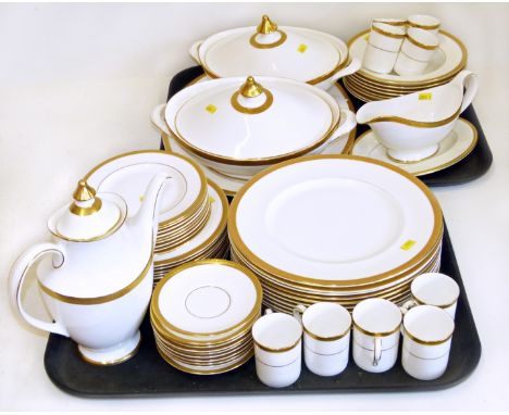 Royal Doulton. "Royal Gold" part dinner service 62 pieces 9 coffee cups, 10 saucers 1 coffee pot, 11 dinner plates, 2 covered