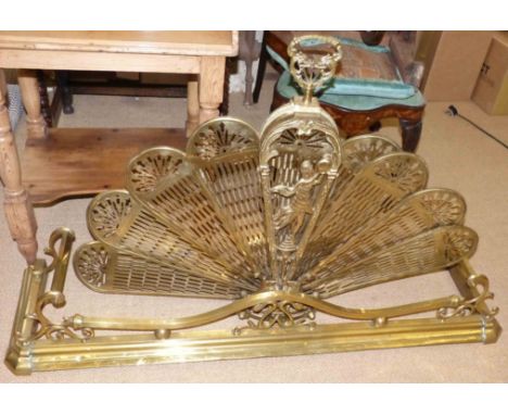 A brass fire kerb and a pierced brass fan shaped adjustable fire screen Condition reports not available for this auction